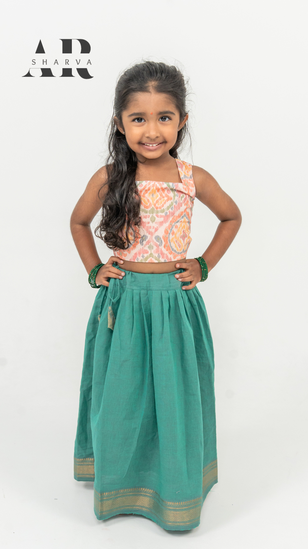 Peachy Ikat and Emerald Pavadai set